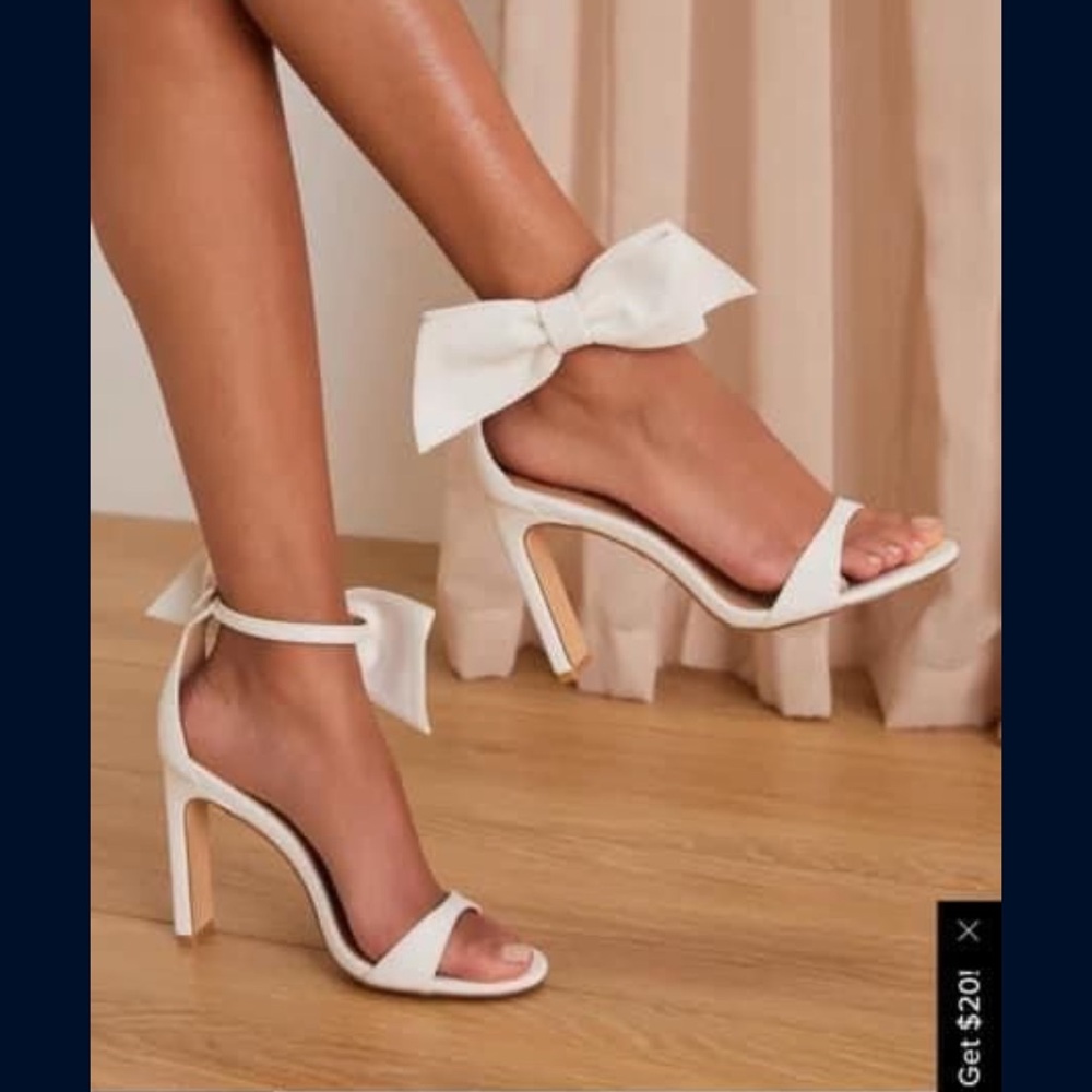 White bow high heels